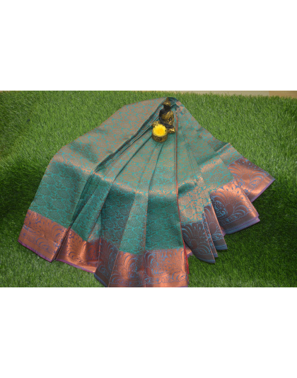 Enchanted Karishmal Green Saree